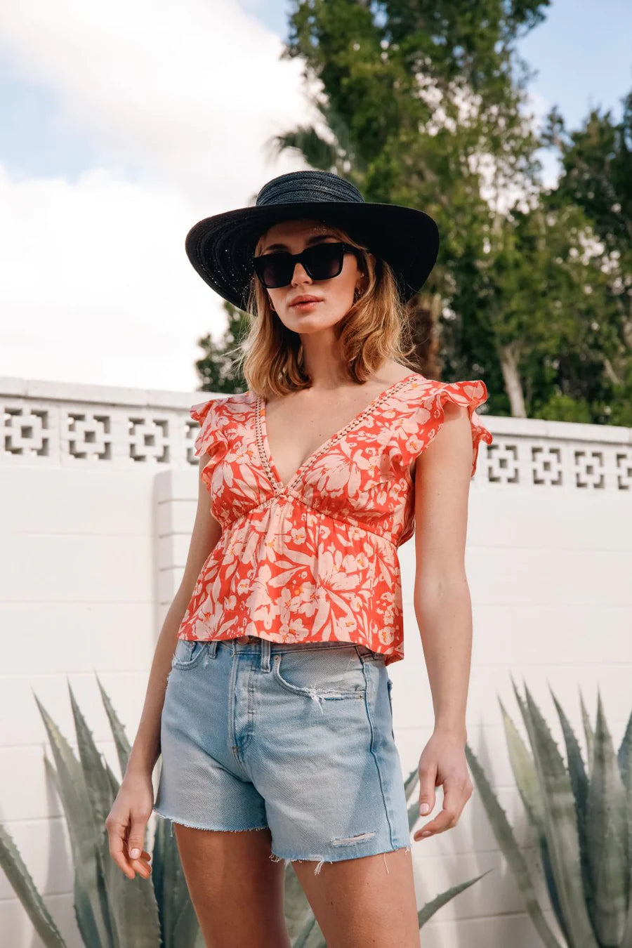 Koy Resort Floral Print Dress in Coral with Ruffled Sleeves and V-Neckline for Summer Fashion