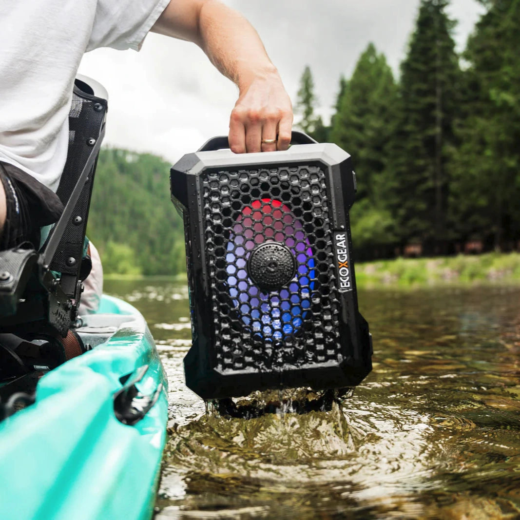 ECOXGEAR Waterproof Bluetooth Speaker with Colorful LED Lights in a Kayaking Setting