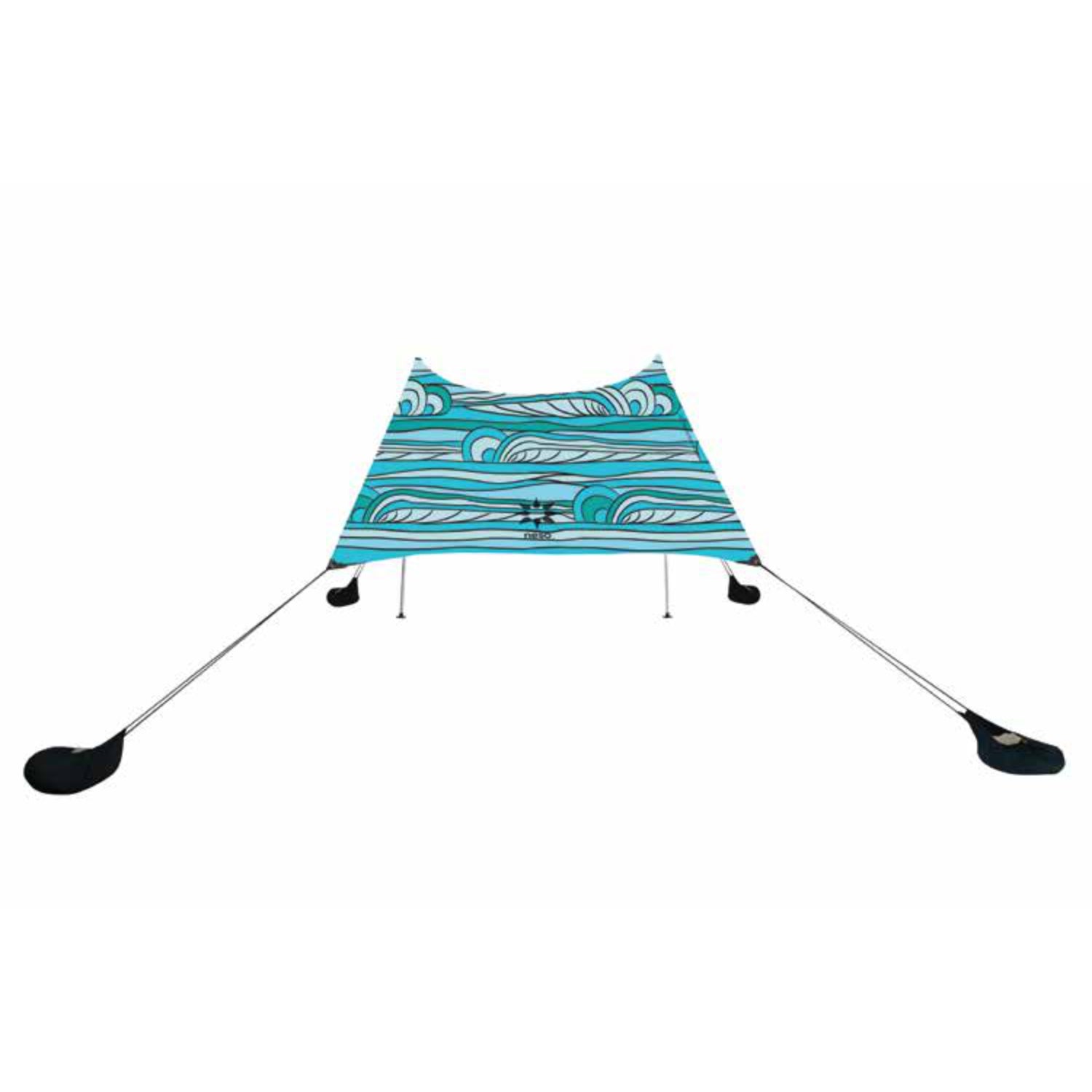 Neso UV protection beach tent with a blue wave pattern, ideal for sunny days at the shore